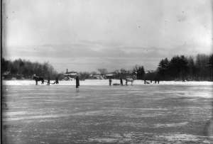 Cutting ice at Cushing Pond